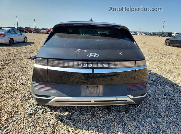 KM8KN4AEXNU072590 2022 HYUNDAI IONIQ Black Widok z tyłu