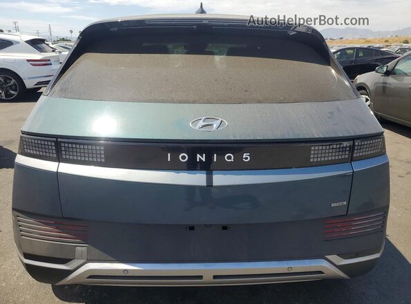 KM8KNDAF1PU172573 2023 HYUNDAI IONIQ Синий Вид сзади