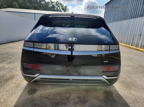 KM8KNDAF5PU230877 2023 HYUNDAI IONIQ Black Вид ззаду