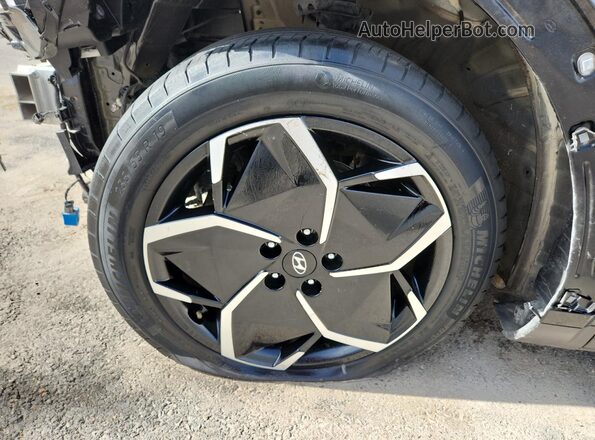 KM8KNDAF5PU230877 2023 HYUNDAI IONIQ Black 