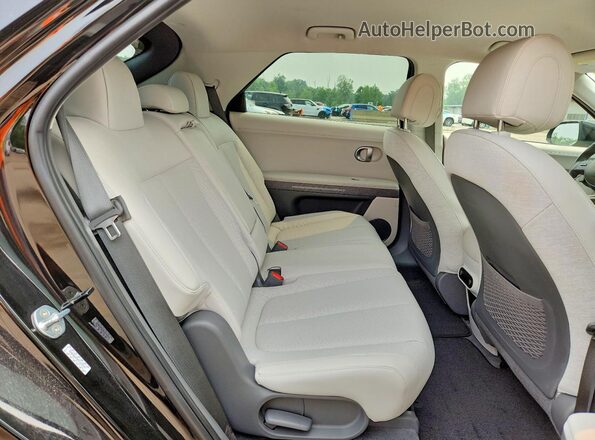KM8KNDAF8PU124374 2023 HYUNDAI IONIQ Черный Вид задней части салона