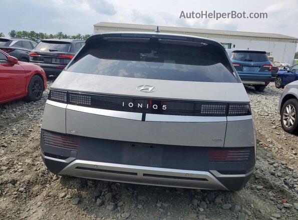 KM8KNDAF8PU189810 2023 HYUNDAI IONIQ Gray Widok z tyłu