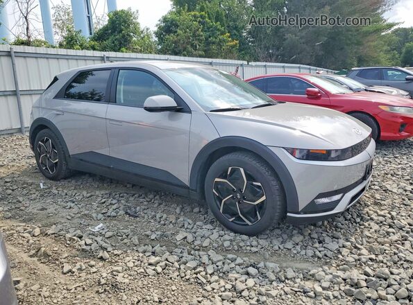 KM8KNDAF8PU189810 2023 HYUNDAI IONIQ Gray Przód prawy