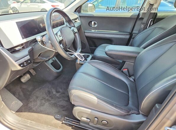 KM8KNDAF8PU215712 2023 HYUNDAI IONIQ Черный Вид салона спереди