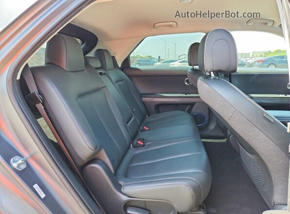 KM8KNDAF8PU215712 2023 HYUNDAI IONIQ Черный Вид задних сидений