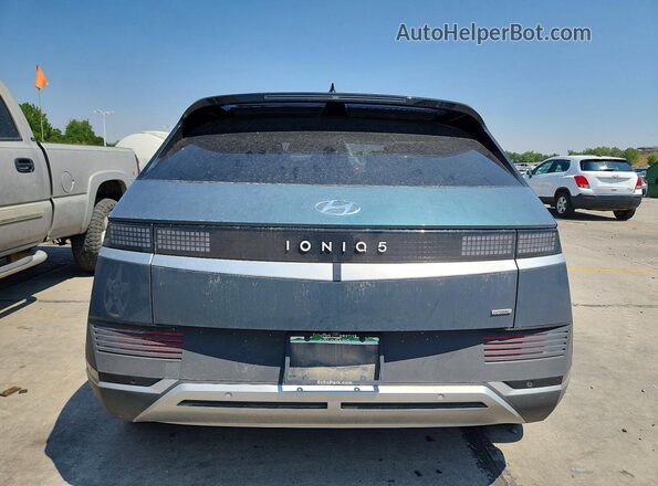 KM8KNDDF1RU288712 2024 HYUNDAI IONIQ Green უკანა ხედი