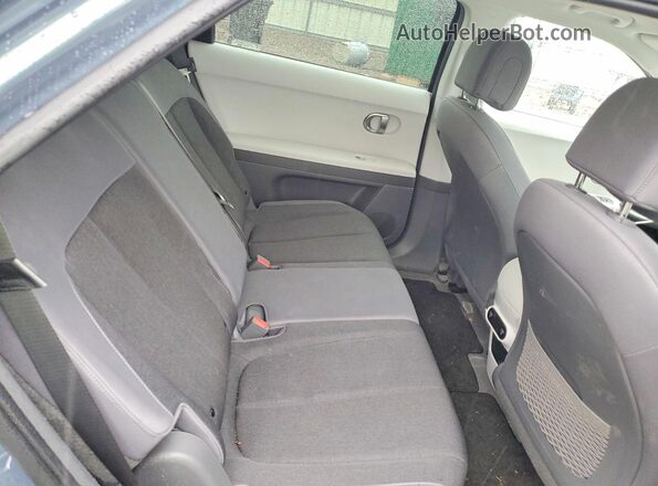 KM8KNDDF5RU299549 2024 HYUNDAI IONIQ Blue Vista interior trasera