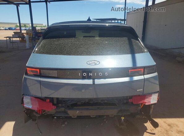 KM8KNDDF6RU266463 2024 HYUNDAI IONIQ Синий Вид сзади
