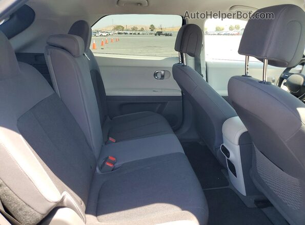 KM8KNDDF7RU301737 2024 HYUNDAI IONIQ Blue Вид задньої частини салону