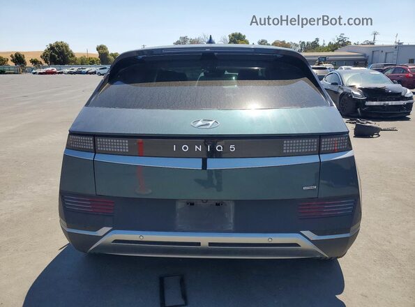KM8KNDDF7RU301737 2024 HYUNDAI IONIQ Blue Вид ззаду