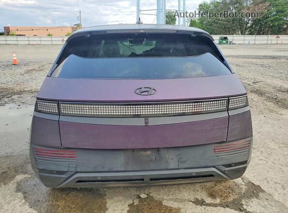 KM8KRDAF2NU077098 2022 HYUNDAI IONIQ Purple Հետևի տեսք