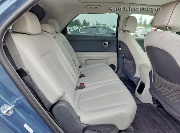 KM8KRDAF8NU068793 2022 HYUNDAI IONIQ Угольный Вид задней части салона