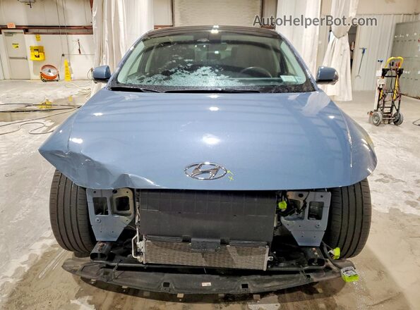 KM8KRDAF8PU227671 2023 HYUNDAI IONIQ Синий Вид спереди
