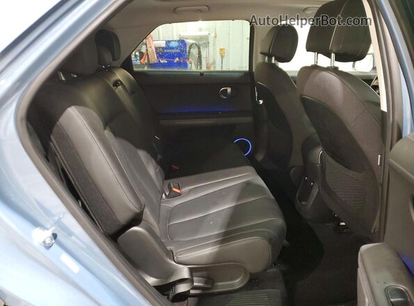 KM8KRDAF8PU227671 2023 HYUNDAI IONIQ Синий Вид задней части салона