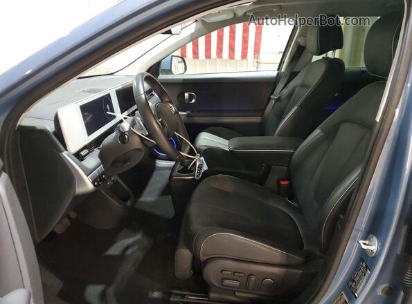 KM8KRDAF8PU227671 2023 HYUNDAI IONIQ Синий Вид салона спереди