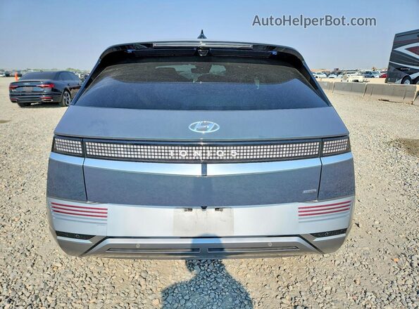 KM8KRDDF0RU330484 2024 HYUNDAI IONIQ Gray Rear view