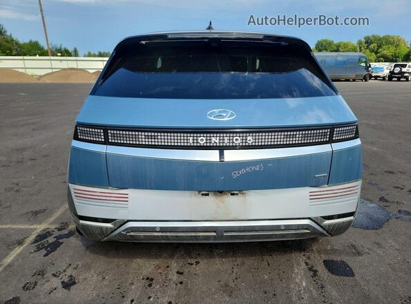 KM8KRDDF4RU333064 2024 HYUNDAI IONIQ Синий Вид сзади