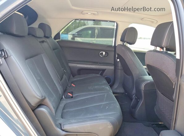 KM8KRDDF9RU322898 2024 HYUNDAI IONIQ Green Սալոնի հետևի տեսք