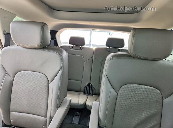 KM8SRDHF9GU138102 2016 HYUNDAI SANTA White Rear seats view