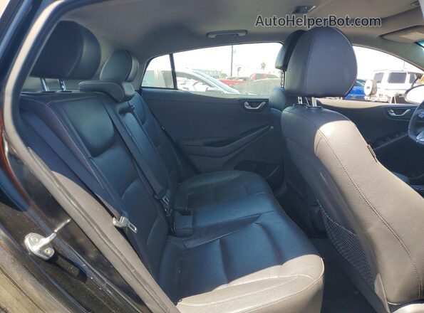 KMHC05LH9JU028977 2018 HYUNDAI IONIQ Black Rear seats view