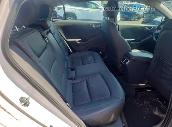 KMHC05LJ1LU059646 2020 HYUNDAI IONIQ White Հետևի նստատեղերի տեսք