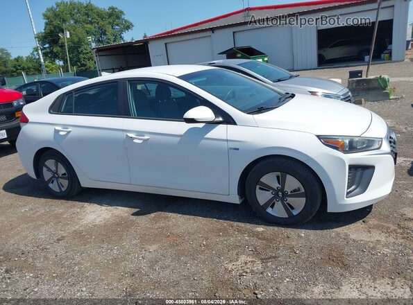 KMHC65LC0LU186338 2020 HYUNDAI IONIQ HYBRID White Rear interior view