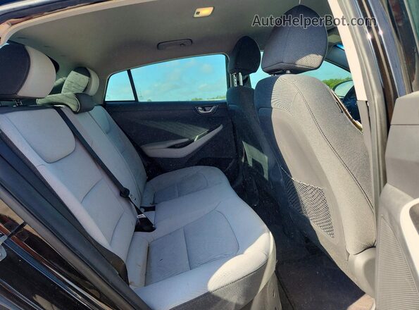 KMHC65LC1NU281235 2022 HYUNDAI IONIQ Black Widok tylnych siedzeń