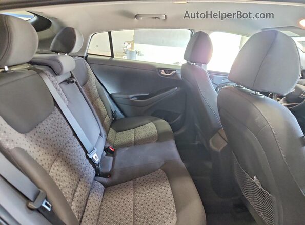 KMHC75LC0JU062211 2018 HYUNDAI IONIQ Gray Vista de los asientos traseros