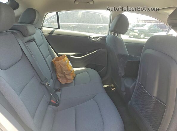 KMHC75LC3NU272999 2022 HYUNDAI IONIQ White Vista de los asientos traseros