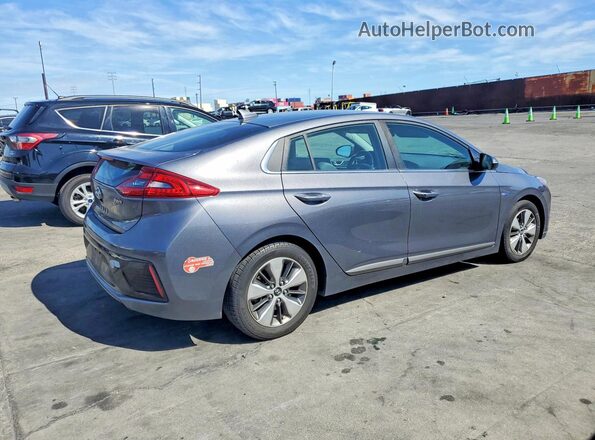 KMHC75LD7JU090614 2018 HYUNDAI IONIQ Gray Trasero derecho