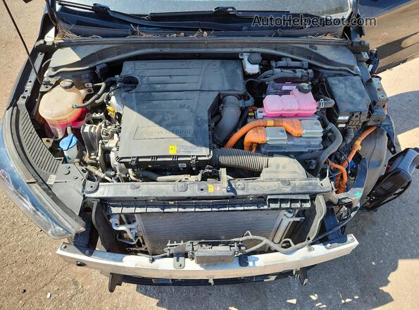 KMHC75LD9NU281487 2022 HYUNDAI IONIQ Black Widok wnętrza z tyłu