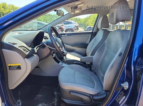 KMHCT4AE0GU013075 2016 HYUNDAI ACCENT Blue Front interior view