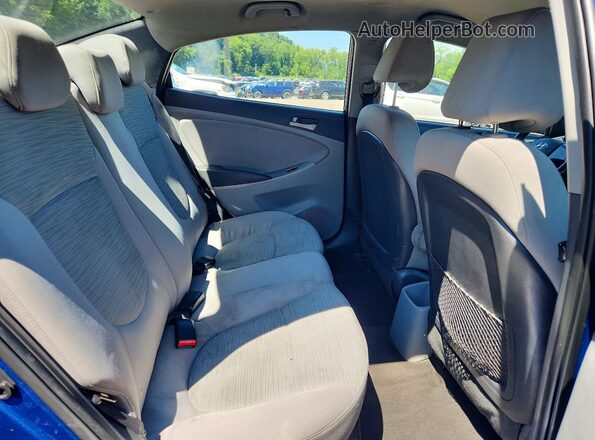 KMHCT4AE0GU013075 2016 HYUNDAI ACCENT Blue Rear seats view