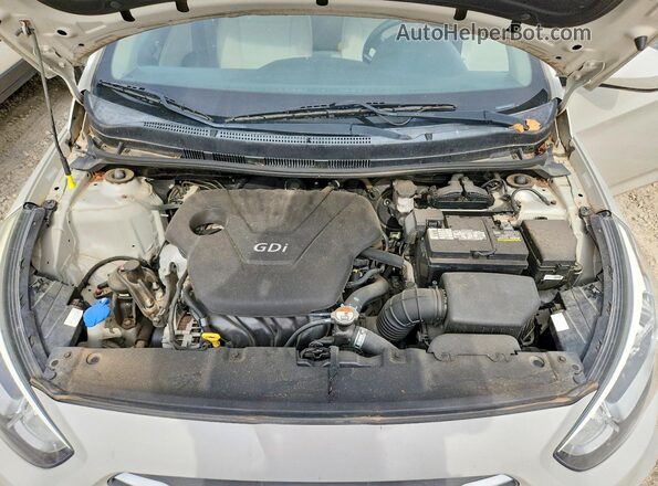 KMHCT4AE0GU090867 2016 HYUNDAI ACCENT Beige უკანა სალონის ხედი