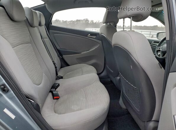 KMHCT4AE0HU373688 2017 HYUNDAI ACCENT Gray Rear seats view