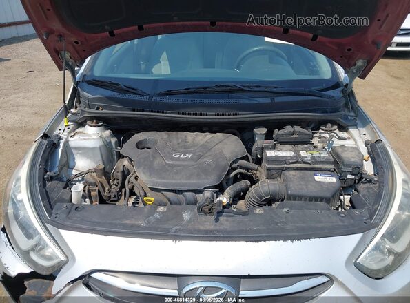 KMHCT4AE1GU981251 2016 HYUNDAI ACCENT Silver Vista trasera