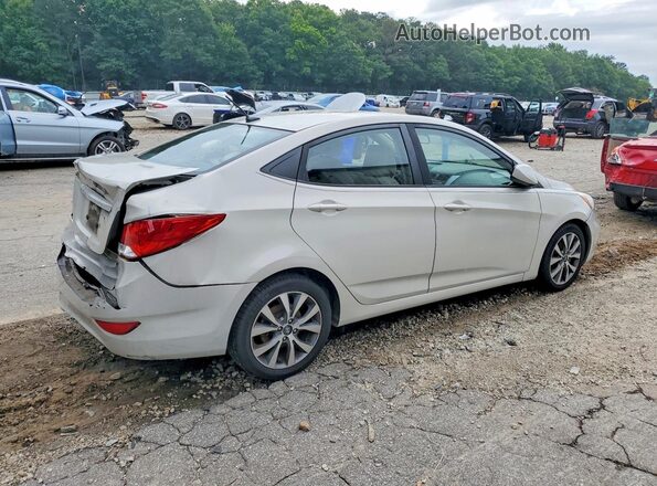 KMHCT4AE1HU264379 2017 HYUNDAI ACCENT Бежевый Задняя правая четверть