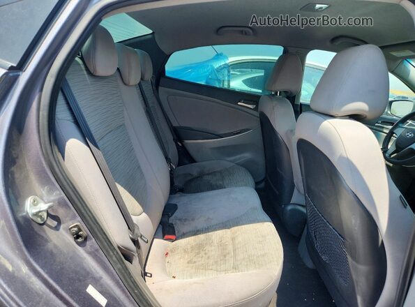 KMHCT4AE4GU070735 2016 HYUNDAI ACCENT Gray Vista de los asientos traseros