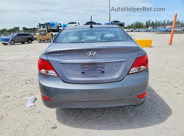 KMHCT4AE4HU278258 2017 HYUNDAI ACCENT Gray Rear view