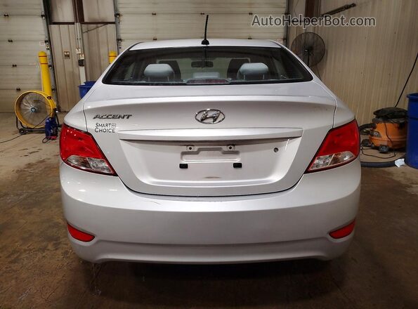 KMHCT4AE5GU004243 2016 HYUNDAI ACCENT Silver Вид ззаду