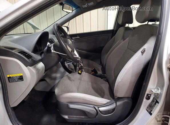 KMHCT4AE5GU004243 2016 HYUNDAI ACCENT Silver Вид салону спереду