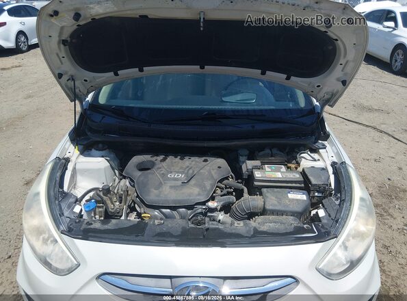KMHCT4AE5GU090847 2016 HYUNDAI ACCENT Серый Вид сзади