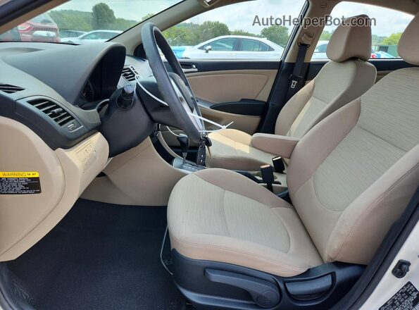 KMHCT4AE6GU961397 2016 HYUNDAI ACCENT Бежевый Вид салона спереди