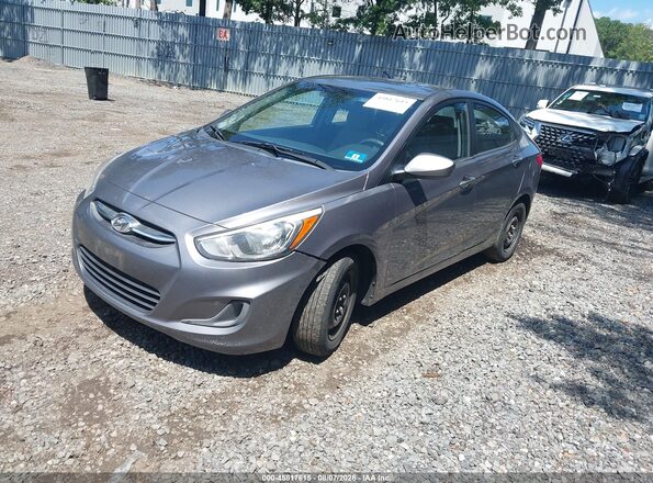 KMHCT4AE7GU966642 2016 HYUNDAI ACCENT Gray Vista tres cuartos delantera izquierda