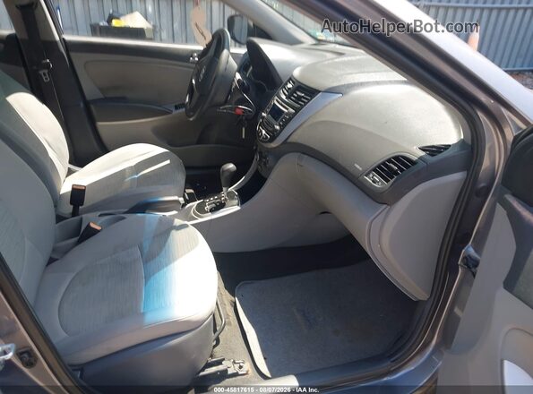 KMHCT4AE7GU966642 2016 HYUNDAI ACCENT Gray Vista interior delantera