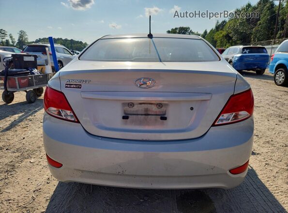 KMHCT4AE7GU966950 2016 HYUNDAI ACCENT Cream Rear view