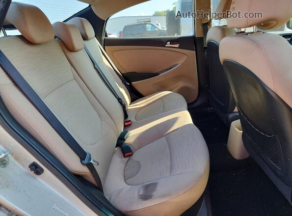 KMHCT4AE7GU966950 2016 HYUNDAI ACCENT Cream Rear seats view