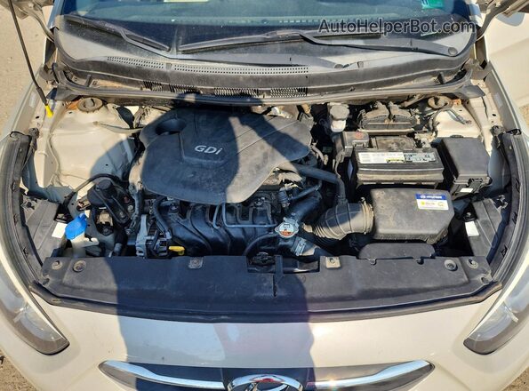 KMHCT4AE7GU966950 2016 HYUNDAI ACCENT Cream Rear interior view
