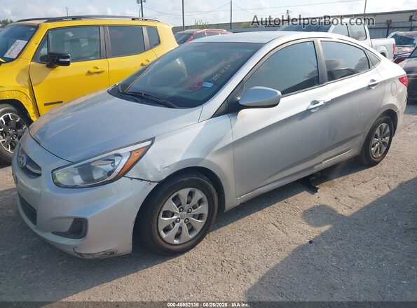 KMHCT4AE9GU128189 2016 HYUNDAI ACCENT Silver Vista tres cuartos delantera izquierda