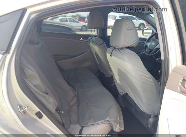 KMHCT4AE9GU128189 2016 HYUNDAI ACCENT Silver Vista de la etiqueta del VIN